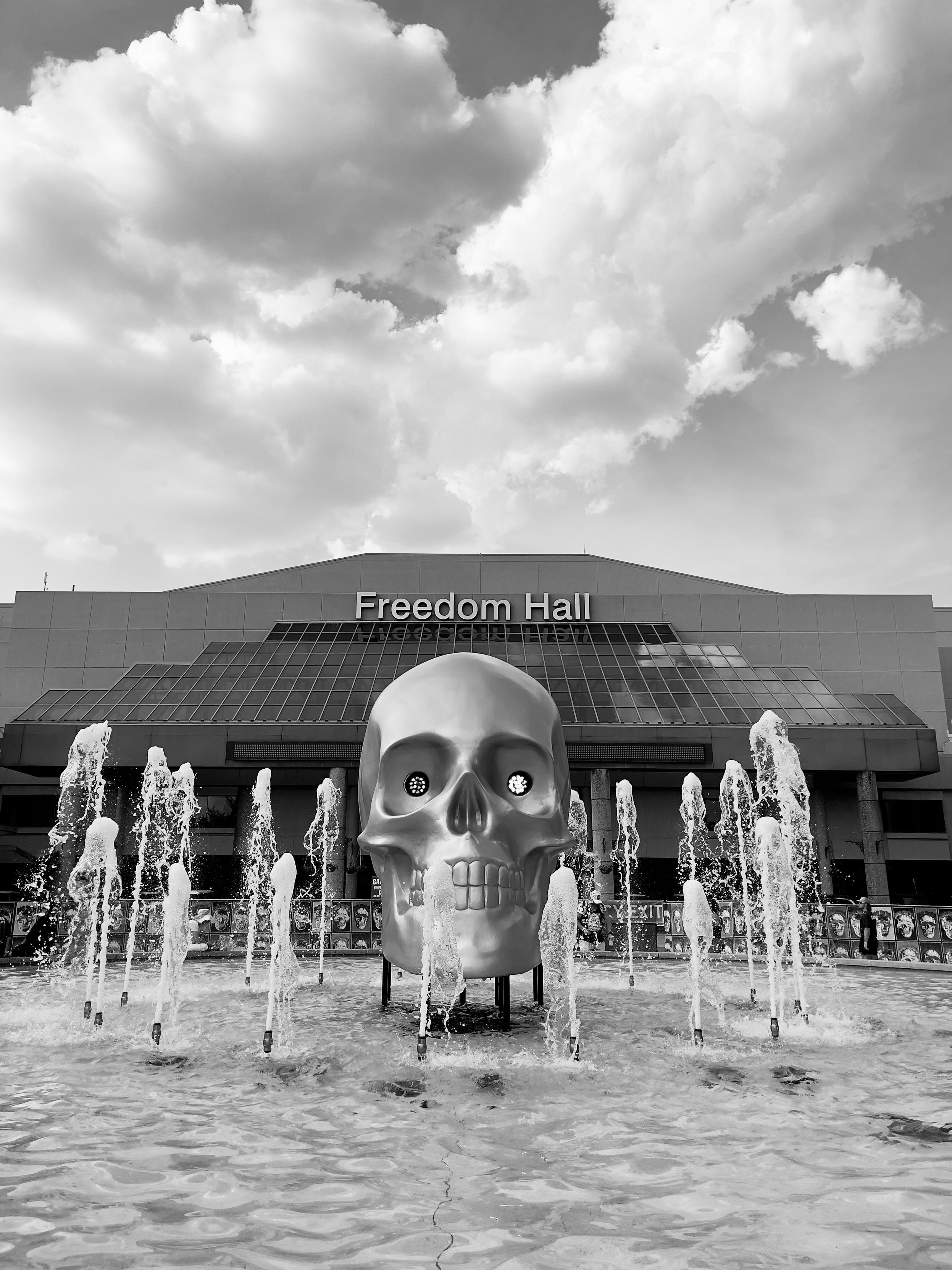 photo of a skull in a fountain photo of a skull in a fountain