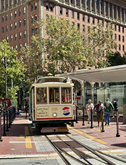 Full information here https://www.streetcar.org/cablecars/55-no-55-cable-car/ 

No. 55
San Francisco Municipal Railway, 1956
Built 1906, J. Hammond & Co.; Rebuilt 2021-25 by Muni Shops
This cable car wears a livery that’s both familiar to San Franciscans and unique at the same time – at least for a double-ended California Street cable car.