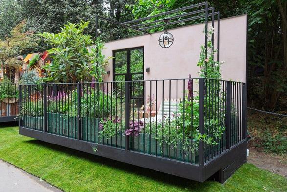 Pink and green themed balcony show garden from RHS Chelsea.