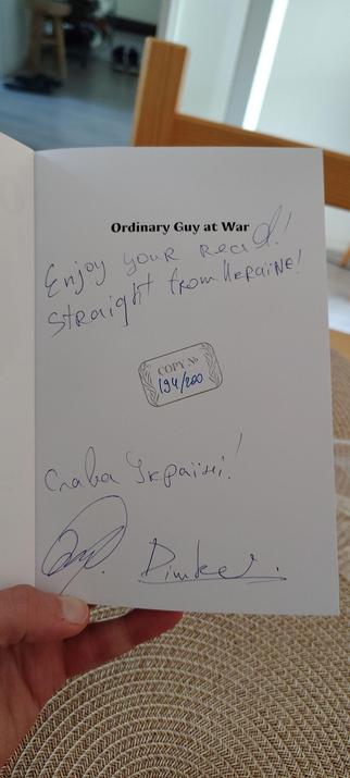 194th signed copy from 200 of the book "Ordinary Guy at War" by Dimko Zhluktenko, showing a personal inscription and signature on the inside cover