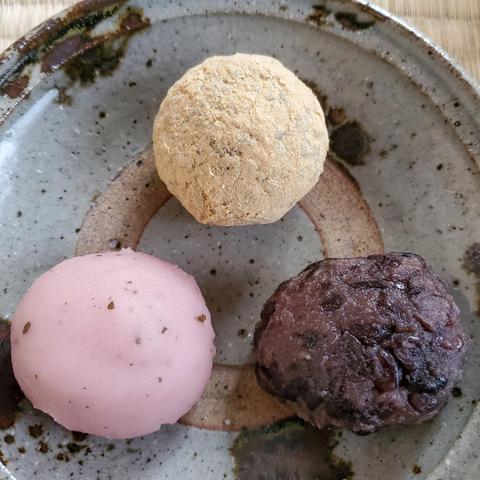 A twist on the usual ohagi (sticky balls of rice covered in red bean jam) for spring. The bottom right is a typical ohagi, but to the left of it is a pink sakura flavored version, and above these one covered in kinako (roasted soy flour).