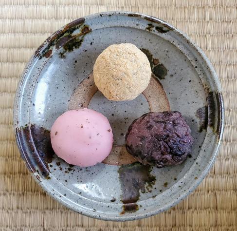 A twist on the usual ohagi (sticky balls of rice covered in red bean jam) for spring. The bottom right is a typical ohagi, but to the left of it is a pink sakura flavored version, and above these one covered in kinako (roasted soy flour).