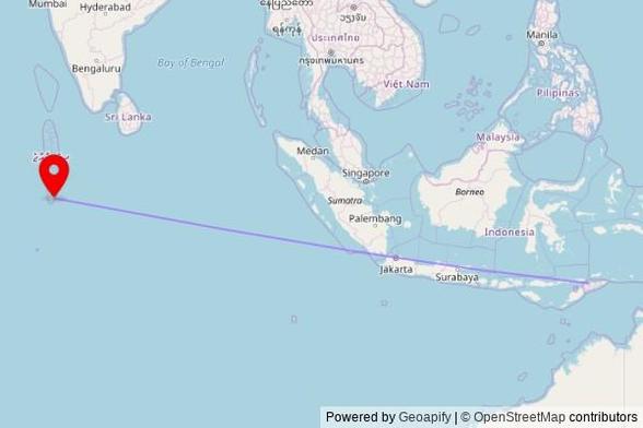 A map showing the great circle route from Nain Feto in Timor-Leste to a map pin at Masjidhul Furugaan, Husnuheenaa magu, Fuvahmulah 18016, Maldives