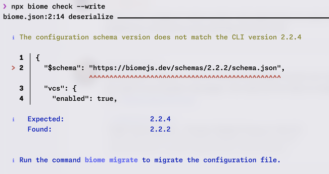 Terminal output showing an error from running "npx biome check --write" indicating a configuration schema version mismatch between 2.2.2 and the CLI version 2.2.4, with a suggestion to run "biome migrate" to update the configuration file.