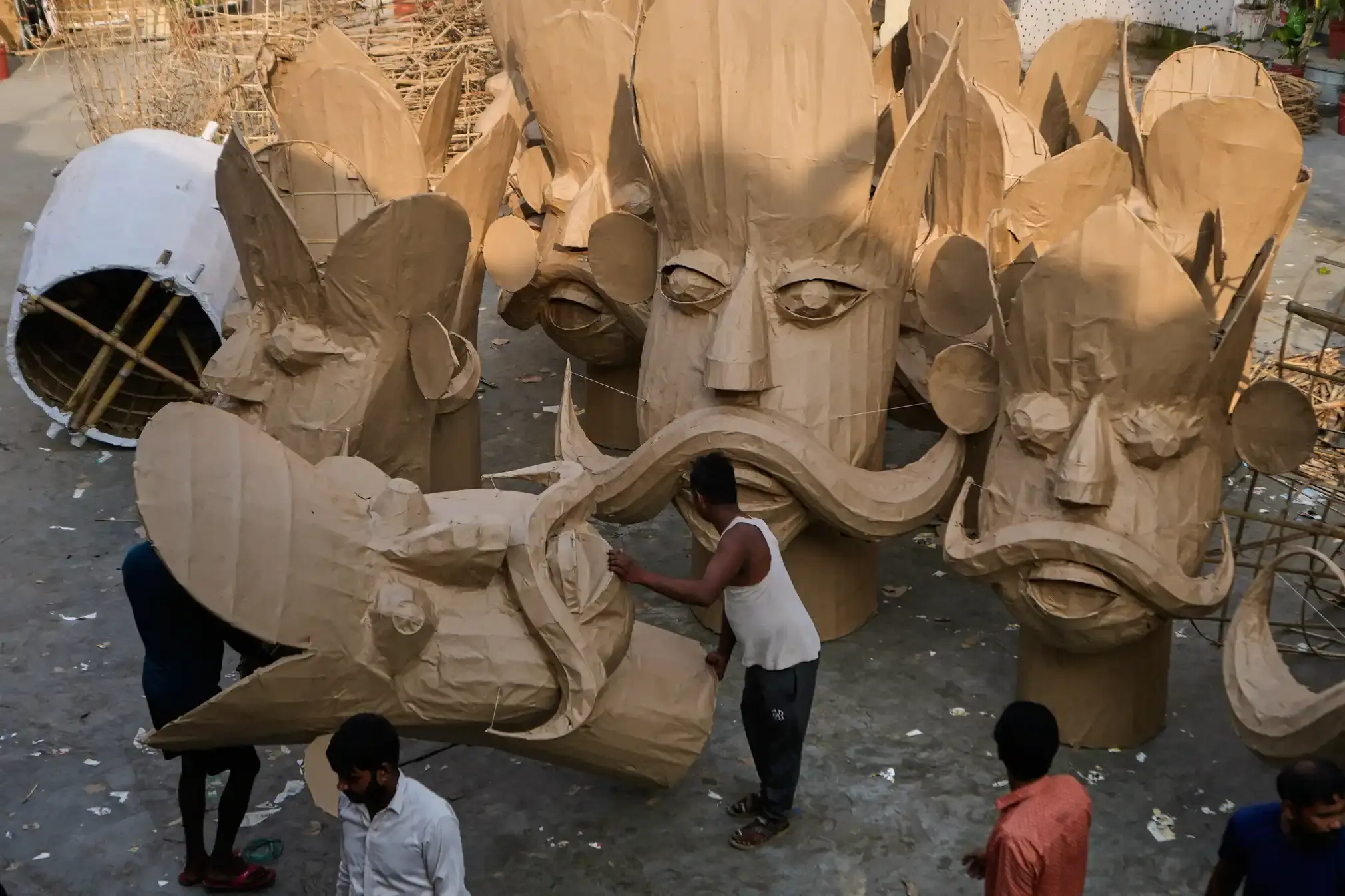 Artisans prepare effigies of antagonists in the Hindu epic Ramayana.