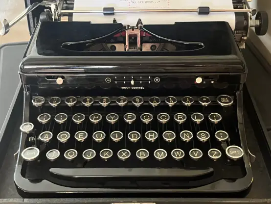 A typewriter with dvorak keyboard layout.