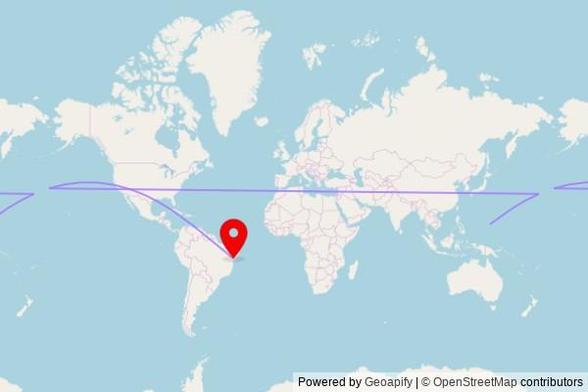A map showing the great circle route from Tamuning in the United States to a map pin at Igreja de Nossa Senhora do Amparo, Praça Frei Serafim do Amparo, Ribeira do Amparo - BA, 48440-000, Brazil