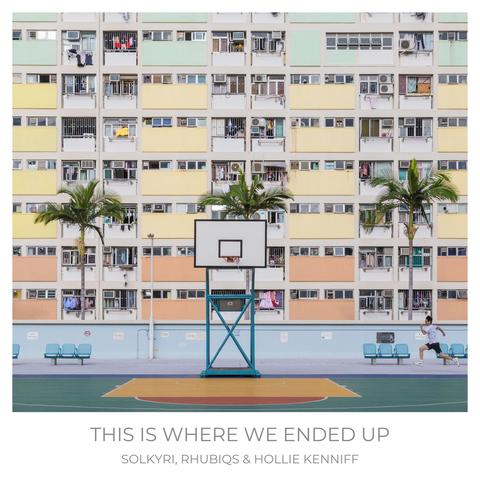 The cover for Solkyri remixed by rhubiqs and Hollie Kenniff - This Is Where We Ended Up, showing a  colourful apartment building with balconies forms the backdrop for a basketball court. A person runs past palm trees. "This is where we ended up" text below.
