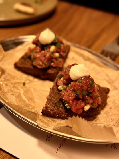Kibbeh on kibbeh. A fried piece of kibbeh, made into a flat cake, is the cracker on which lamb tartare sits. Incredible dish, and I’m going to have to remember to make it at home. 