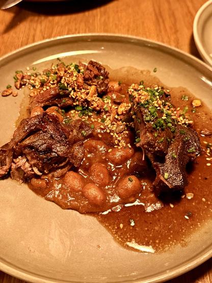 Beef cheeks and tongue perfectly cooked and paired with beans