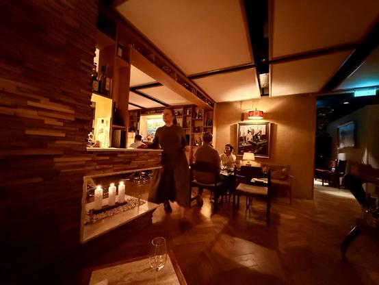 The interior of a 1970s grandma’s living room themed bar