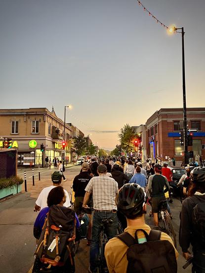 A traffic bike jam on rue Masson with sunset colours