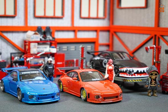 Three cars of Old & New 997 by Tarmac Works in 1:64 scale with 1:64 figures on AREA 164