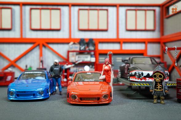 Three cars of Old & New 997 by Tarmac Works in 1:64 scale with 1:64 figures on AREA 164