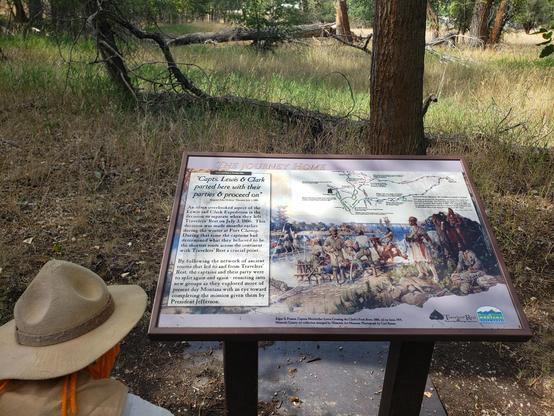 Ranger Sarah learns that the decision to have Capts. Lewis and Clark to part and take different routes was made months earlier at Fort Clatsop. Read the sign at https://www.hmdb.org/m.asp?m=123256
— at Travelers' Rest State Park.