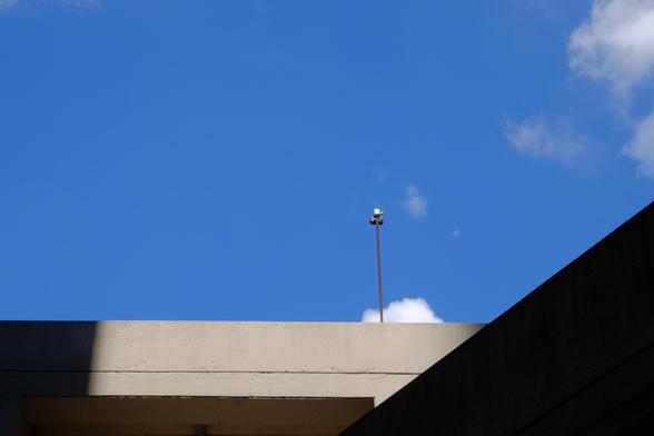 Blue sky and light pole 
