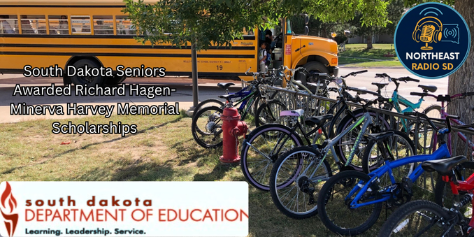Bikes parked by a red hydrant and school bus under trees. Text: South Dakota seniors awarded scholarships. South Dakota Department of Education logo.