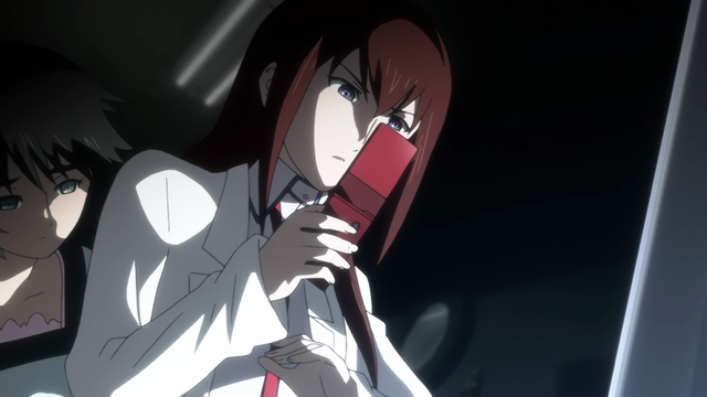 A woman (Kurisu) in a lab coat holding a red flip phone in her hand.