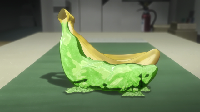 A set of three bananas with one turned to green goo.