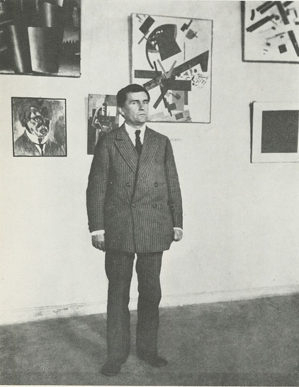 Kazimir Malevich with his paintings in Leningrad (1924)