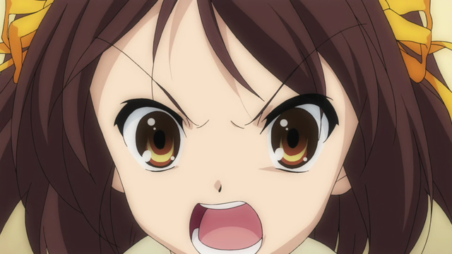 A girl (Haruhi) with a very angry/loud expression.