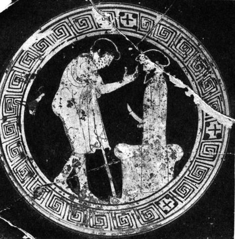Red-figure vase painting of a man, likely a traveller judging from his chlamys cloak and walking stick, honouring a herm of Hermes. A herm is a simple statue of Hermes and sometimes other gods with a head and an erect phallus at the appropriate height.