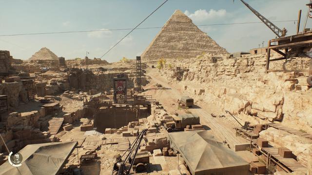 Scene from the game Indiana Jones and the Great Circle. A Nazi dig site outside the great pyramids in Egypt surrounded by tents and cranes.
