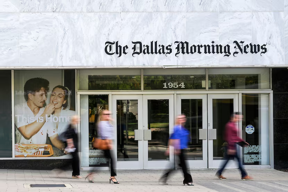 Pedestrians pass the headquarters of The Dallas Morning News at 1954 Commerce Street in Dallas on Monday, Sept. 22, 2025.
Smiley N. Pool / Staff Photographer