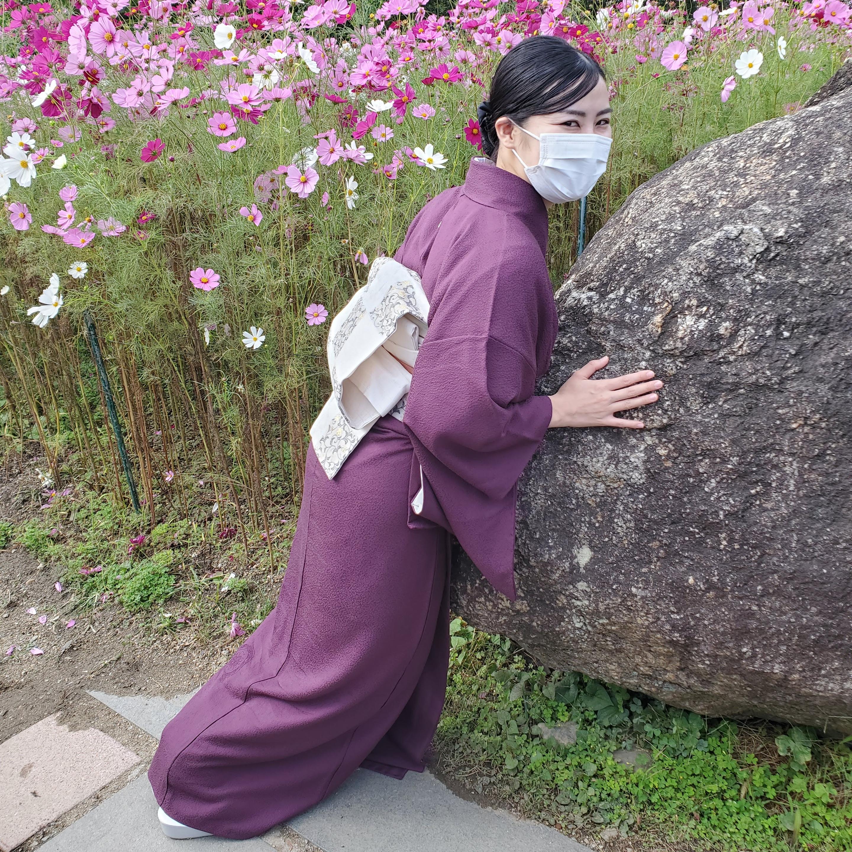 Visitors to Hannya-ji place their bellies and back against the 'Kanman-ishi'. It is said the rock grants good health.