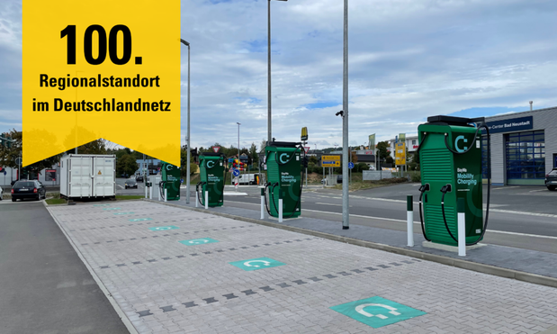 100. Regionalstandort im Deutschlandnetz (100th regional location in the German Deutschlandnetz charging network)

Image shows a row of parking spaces with EV charging stations