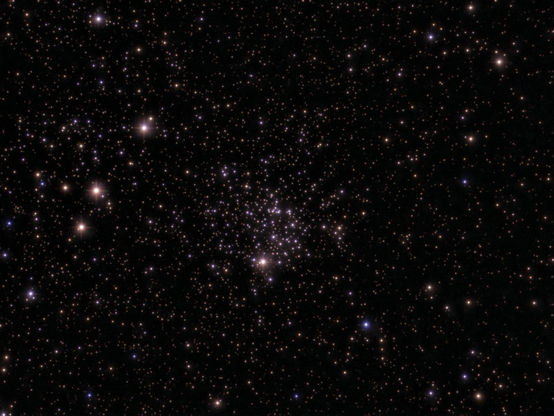 The M52 The Scorpion cluster. - telescope processed image. M52, the Scorpion Cluster, is a rich, condensed open star cluster in Cassiopeia. It contains \approx200 stars and lies \approx5,000 light-years away.