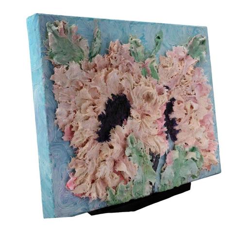 

The swirling blue background contrasts beautifully with the soft cream and blush petals, evoking movement and warmth. Each element was sculpted with a palette knife, creating a tactile experience that invites touch and emotion.