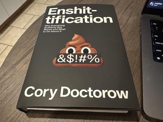 Snapshot of Cory Doctorow's latest book - Enshittification - on my kitchen table.