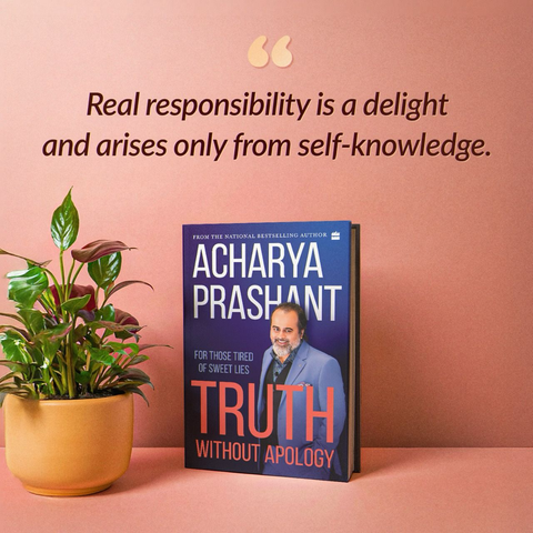 A book titled "Truth Without Apology: For Those Tired of Sweet Lies" by Acharya Prashant is displayed upright on a pink surface next to a potted green plant in a yellow pot. Above the book, a quote reads: "Real responsibility is a delight and arises only from self-knowledge." The background is a smooth pink gradient wall.