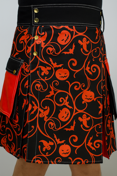 Kilt utilitaire hybride d’Halloween avec motif Jack O’Lantern, combinant design moderne, poches fonctionnelles et imprimé festif orange et noir.