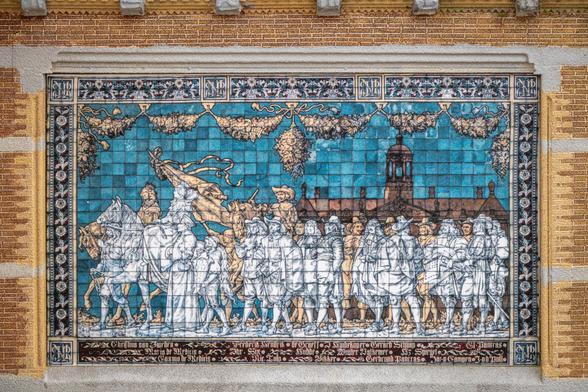 A close-up photograph showing some of the details of of a tile panel on the 1:25 scale model of the Rijksmuseum in Amsterdam.
