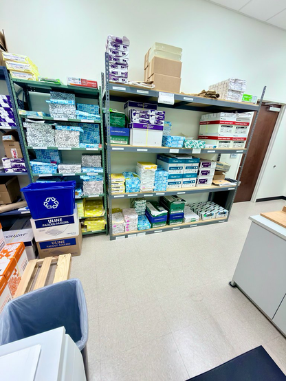 My primary work area with freshly organized shelves of paper supplies.