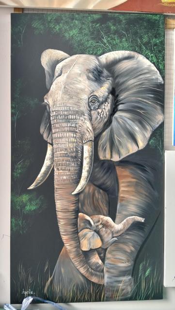 a painting of a father and son elephant, the son is rubbing its face against its father's large leg, foliage behind them 