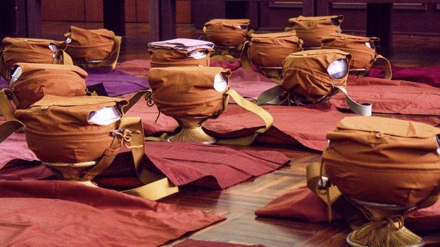 Many Buddhist monastic bowls.