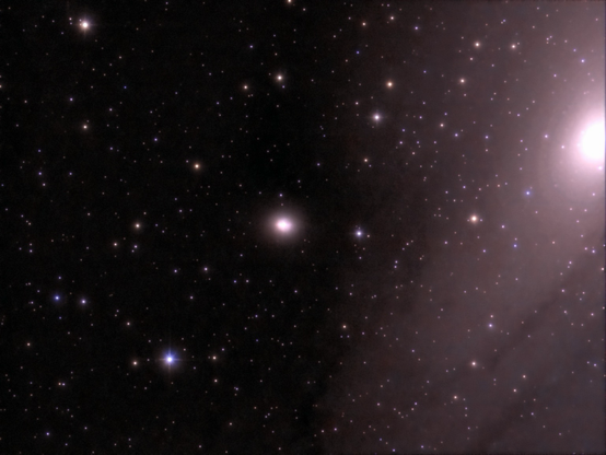 M32 galaxy - telescope processed image.  M32 is a dwarf compact elliptical galaxy in Andromeda. It's a satellite of the M31 galaxy and has an extremely dense core with a supermassive black hole.