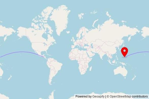 A map showing the great circle route from Santa Ana in El Salvador to a map pin at Saint Anthony Catholic Church, Gumayuos Street, Tamuning, GU 96911, United States of America