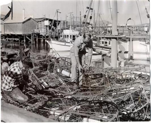 B. Bellante and C. Crivelo giving their crab pots a final check before they leave Fisherman's Wharf