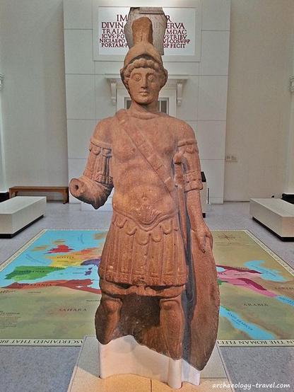 The statue stands to a height of 1.78 m, though it is missing the feet from below the ankle and any plinth it may have originally stood on. Mars is depicted as a youthful soldier, wearing a Greek helmet and bearing a large oval shield held in his left arm. He is wearing a cuirass with elaborate lappets beneath and at the sleeves over a tunic. He has a sword strapped on his left side. His right arm is extended but the hand is missing. It probably held a spear originally.