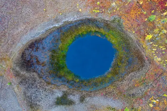 A blue "eye" in the tundra.