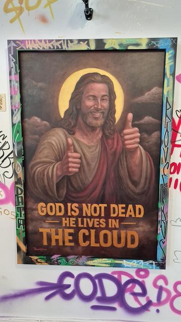 Jesus with thumbs up and text 'God is not head he lives int eh cloud'