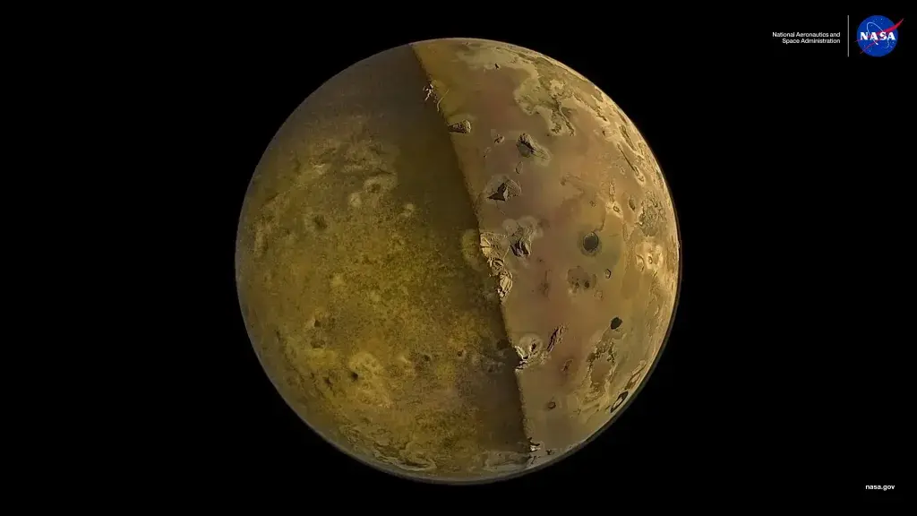 Image of Io showing the sunlit right side and the Jupitershine-lit left side in exquisite detail, revealing numerous volcanoes and lava plains scattered throughout.