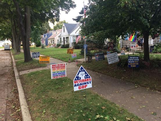 A yard filled with anti-fascist signage.