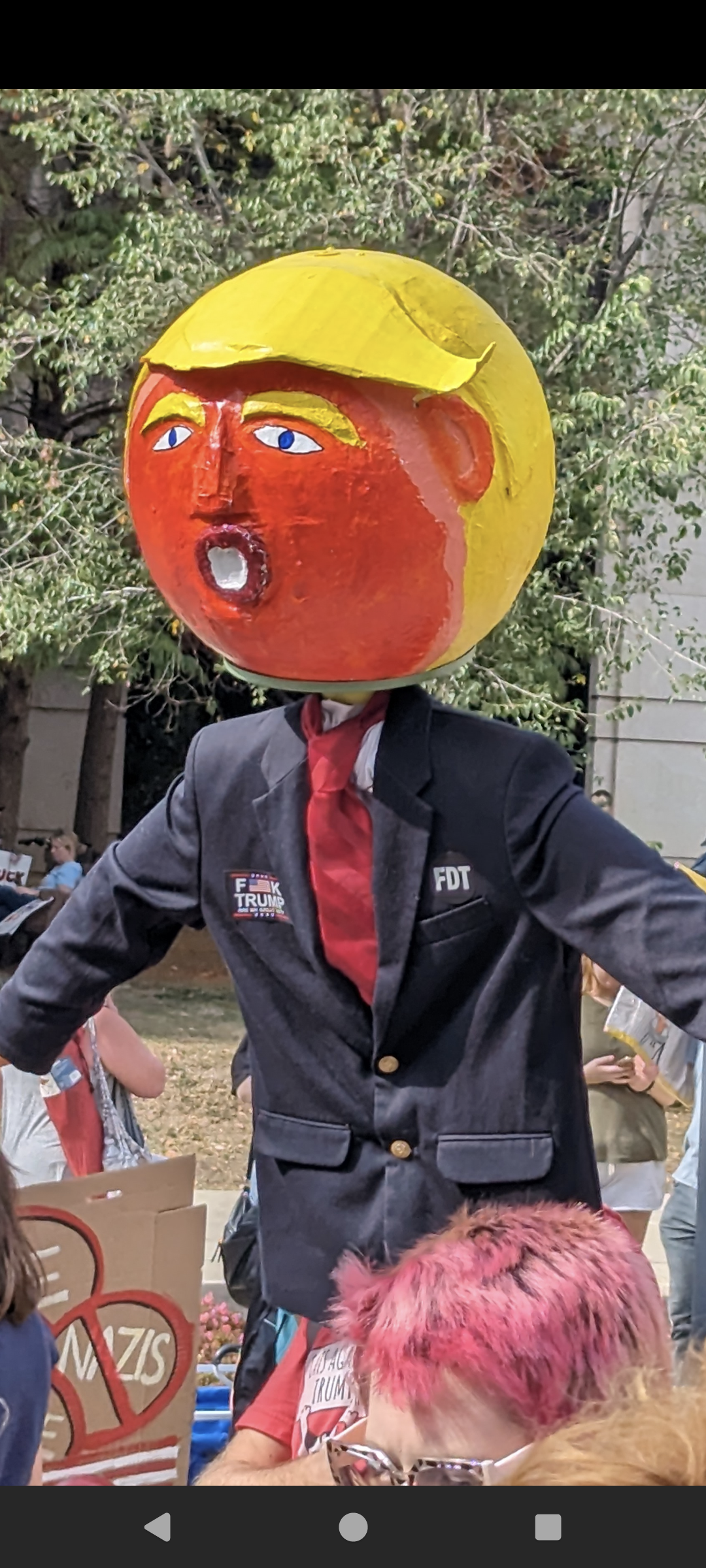 Orange faced Papier-mâché puppet