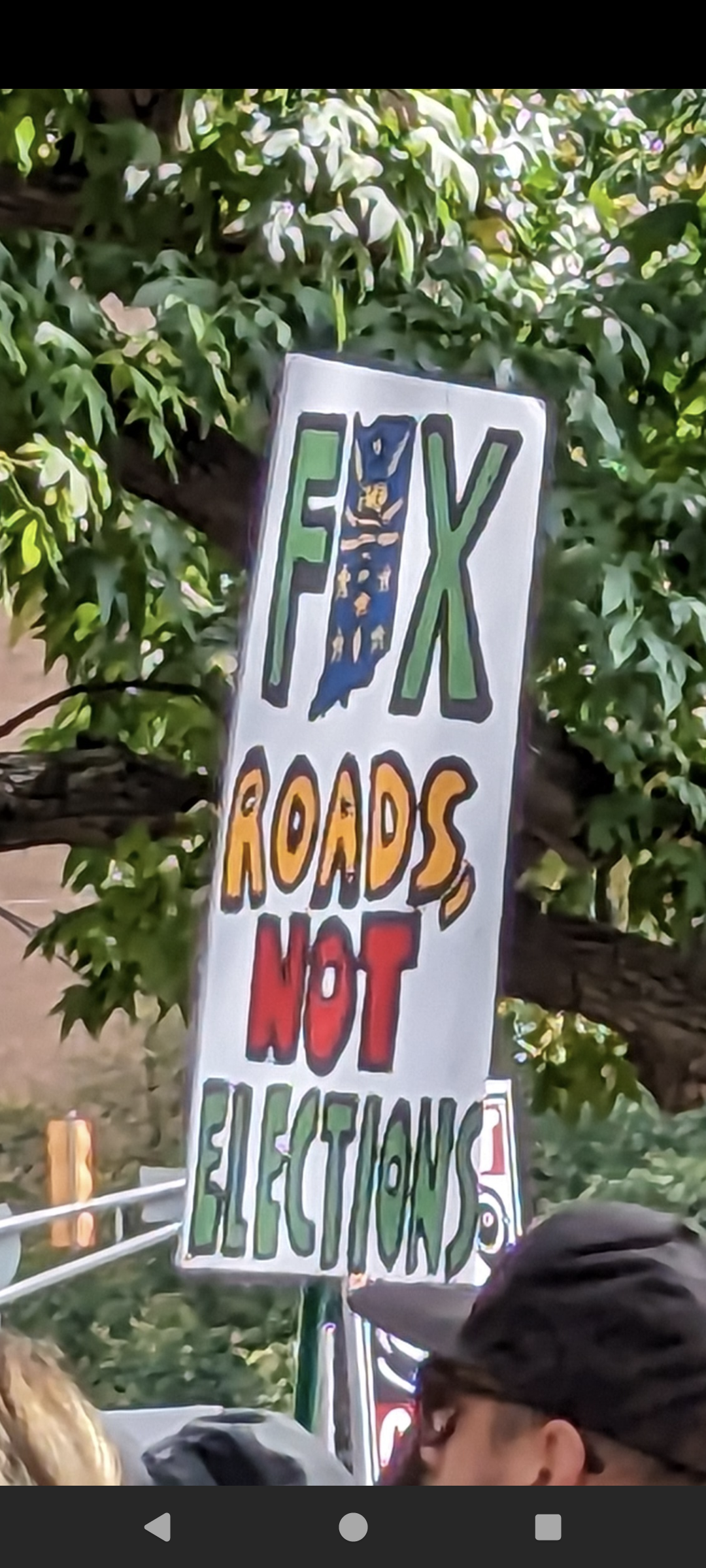 The most Indiana protest that says fix roads not elections