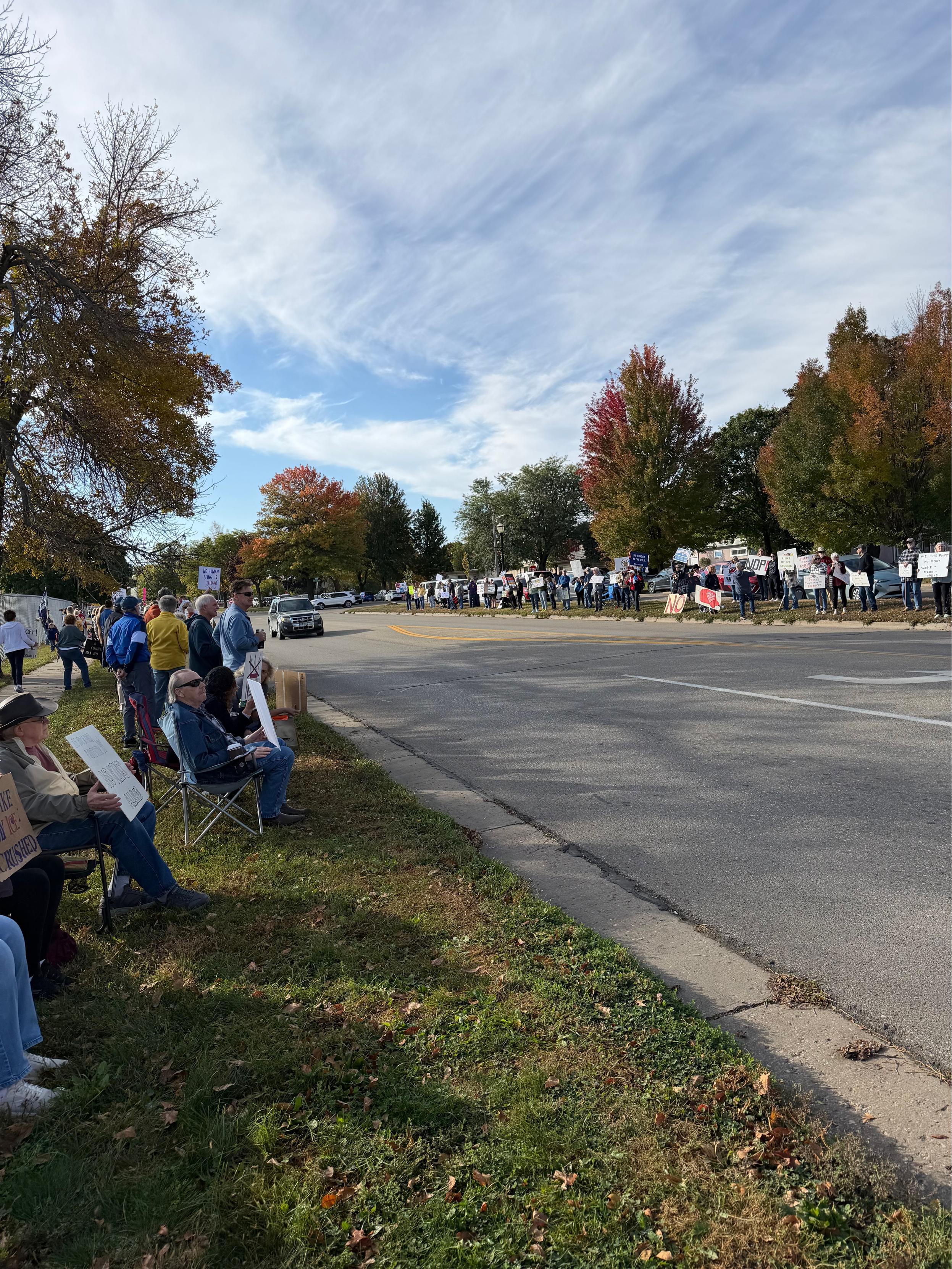 Looking down the street at the crowd gathered